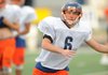  Rogers Heritage defensive back Christian Wages tracks down a pass Wednesday, Aug. 10, 2011, during practice at Gates Stadium in Rogers.
