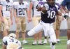 Fayetteville’s Casey Perry looks for running room during a scrimmage against Pulaski Academy on Monday.