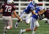 Rogers High junior Stokes Wenzler rushes against Siloam Springs during a scrimmage Tuesday at Jarrell Williams Bulldog Stadium in Springdale.