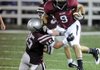 Springdale High senior Henry Hernandez pushes past Siloam Springs’ Austin Van Poucke during a scrimmage Tuesday at Jarrell Williams Bulldog Stadium in Springdale.
