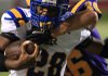 Arkansas Democrat-Gazette/STATON BREIDENTHAL
9/8/10
North Little Rock's Kendall Williams (28) tries to get away from Catholic's Jordan Hartnedy during the second quarter of their game Thursday night at War Memorial Stadium.