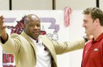  Arkansas Democrat-Gazette/KAREN E. SEGRAVE
8/25/11

Mike Anderson, head basketball coach for the Arkansas Razorbacks (L) jokes with former Razorback Pat Bradley,  at the Razorback Club dinner held at Park Hill Baptist Church in North Little Rock on Thursday.