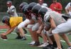  The Russellville Cyclones work on extra point formations.