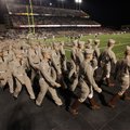 In this Nov. 20, 2010, photo, Members of the Texas A&M Corps of Cadets enter the stadium before an N...