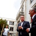 G. David Gearhart (left), chancellor of the University of Arkansas at Fayetteville, talks Tuesday wi...