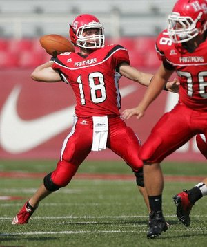 Arkansas Democrat-Gazette/RYAN MCGEENEY - 09-01-2011 - Heber Springs quarterback Michael Ludwig winds up for a pass during the first half of Thursday's Kickoff Week game against Shiloh Christian at Razorback Stadium in Fayetteville. 