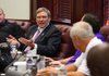 University of Central Arkansas President Allen Meadors answers a question from Trustee Bobby Reynolds (right) during a specially called meeting Thursday in Conway.

