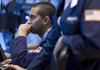 A trader works on the floor of the New York Stock Exchange on Friday, Sept. 2, 2011 in New York. The jobs report was the weakest in almost a year. It renewed fears that the U.S. might slip back into recession. (AP Photo/Jin Lee)