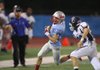 #1 AJ Rosenburg of Southside gets outside the Conway defense for a first down.