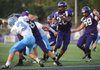 Fayetteville junior running back Brice Gahagans, center, carries the ball into the end zone on Friday during the first half of the Dogs’ win over Parkway West at Harmon Field.