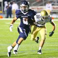 Justin Sunde of Greenwood breaks a tackle for a first half TD.