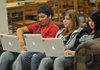 Arkansas Democrat-Gazette/MICHAEL WOODS  --09/14/11-- Lincoln High School 10th graders (left to right)  Zackery Martinez, Allison Musteen, and Erica Watkins work on their laptops in the library during class Wednesday afternoon at Lincoln High School. 