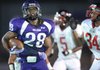 Brice Gahagans, left, a Fayetteville junior running back, carries the ball during the Bulldogs victory against Russellville. Ball security will be of utmost concern this week as Fayetteville takes on No. 1 Bentonville.