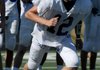 Nick Carter, a Rogers senior receiver, runs through drills at practice Tuesday at the school in Rogers. Carter missed all of spring and summer after breaking a leg skiing in Colorado.
