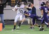 STAFF PHOTO ANDY SHUPE - Bentonville senior receiver Mason Snow (23) nears the end zone as Fayetteville senior cornerback Neil Watson (19) reaches to make the tackle Friday, Sept. 23, 2011, during the first half of play at Harmon Field. Go to photos.nwaonline.com to see more photos.