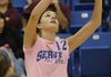 Rogers High School’s Allie Krabbenhoft hits the ball on Sept. 22 while hosting Heritage High School.