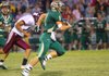 #1 Matt Woosley of Alma returns a kick-off for a first half TD.