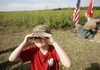  Arkansas Democrat-Gazette/WILLIAM MOORE
Peyton Jones, 6, of Van Buren puts on a Ducks Unlimited hat after a ceremony to dedicate the Frog Bayou Wildlife Management Area Saturday, September 24, 2011 outside of Dyer.  The area sets aside 800 acres for wildlife.