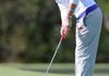 Fayetteville’s Anna Grace Lavy putts on the 11th green during the 7A state girls golf tournament Monday at the Fayetteville Country Club.