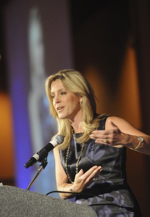 Author and broadcaster Deborah Norville tells the story Tuesday of delivering a newscast the same day she delivered a baby. Norville was the keynote speaker at the Northwest Arkansas Business Women’s Conference in Rogers.