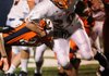 Rogers Heritage’s Tim Cole runs upfield against Springdale Southwest during the first half of their game on Sept. 29 in Jarrell Williams Bulldog Stadium in Springdale.
