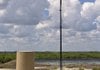  Natural gas is flared at the Handy Gas Unit #1, a Pioneer Natural Resources well, in Karnes County, Texas, U.S., on Tuesday, June 22, 2010. Reliance Industries Ltd. agreed to pay $1.3 billion to Pioneer Natural Resources Co. and its partner for its second purchase of shale gas assets in the U.S. in three months. The company will pay $263 million up front and fund $1.1 billion of Pioneer and Newpek LLC's drilling costs in a joint venture in the Eagle Ford formation in south Texas, Reliance said in a statement. Photographer: Eddie Seal/Bloomberg