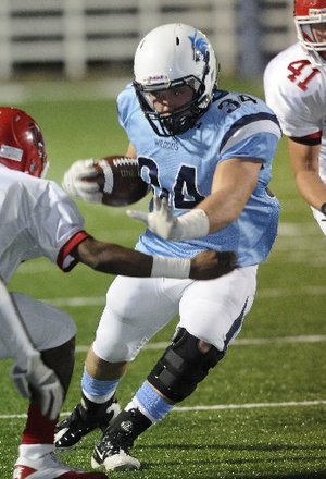 STAFF PHOTO J.S. WEDGEWORTH - Har-Ber High's Tucker Lee runs the ball Friday, Sept. 30, 2011, while hosting Fort Smith Northside at Springdale. 