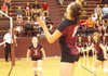 Gentry sophomore Jordan Olds attacks the ball in play against Pea Ridge on Thursday. Emilia Barrick and Josie Graves are in the background.