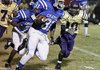 Parkers Chapel’s Kylaus Williams (81) looks for running room as Junction City’s Shaquille Hunter (10) looks to make a play in a 2010 game. Hunter had four interceptions and scored two touchdowns Friday in Junction City’s 28-6 victory over Strong.