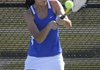 Rogers High’s Tiffany Tang returns a shot against Fort Smith Southside’s Lindsey Pearce during the finals of the 7A-West Conference Tennis Tournament on Thursday at Memorial Park in Bentonville.
