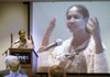 Dr. Sherece Y. West, president and chief executive officer of the Winthrop Rockefeller Foundation, talks Friday at the Hispanic Women’s Organization of Arkansas’ annual conference at the Jones Center in Springdale. West spoke to the group about immigrant rights.
