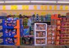 Joan Scarbrough shops for grocery items Wednesday at Aldi at the corner of Appleby Road and College Avenue in Fayetteville. The discount grocery chain will be moving to southwest Fayetteville in March and closing the store on College that opened in 1993.
