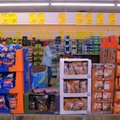 Joan Scarbrough shops for grocery items Wednesday at Aldi at the corner of Appleby Road and College ...