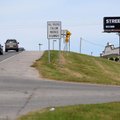A digital billboard belonging to Ashby St. Outdoor stands near the boundary between Springdale and F...