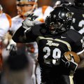 Tearris Wallace, Bentonville running back,  back makes a cut inside on first quarter carry Friday du...
