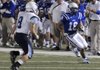 Rogers High’s Stokes Wenzler tries to get around Har-Ber High defender Seth Banks on Friday while hosting Har-Ber High.
