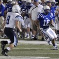 Rogers High’s Stokes Wenzler tries to get around Har-Ber High defender Seth Banks on Friday while ho...