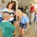 HOME SWEET HOME Wendi Jones, center, executive director of Habitat for Humanity of Washington County...