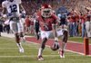 University of Arkansas receiver Joe Adams breaks away from the Auburn defense to score a touchdown in the 3rd quarter of Saturday nights game at Razorback Stadium in Fayetteville.
