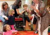 Marie Vukin reads and interprets a book by Elizabeth Rusch titled “A Day With No Crayons” for a group of preschool children at the Bentonville Public Library. Vukin is director of Trike Theatre’s Dramatic Book Club, a new program at the Bentonville, Rogers, Springdale and Fayetteville libraries.