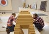 Elezabeth Kozlowski, left, and Adam Crowley, both assistant preparitors at Crystal Bridges Museum of American Art , assemble a sculpture by artist Jackie Ferrara at the museum in Bentonville, Ark., Thursday, Oct. 13, 2011. The museum is scheduled to open Nov. 11. (AP Photo/Danny Johnston)
