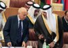 Arab League Secretary General Nabil al-Arabi, left, talks to Qatari Foreign Minister Sheikh Hamad bin Jassim Al Thani, Sunday, Oct.16, 2011, during an Arab Foreign Ministers meeting at the Arab League headquarters in Cairo to discuss the possibility of suspending Syria's membership of the league. The Arab League has called an emergency meeting Sunday to discuss whether to suspend Syria, officials said, ramping up the pressure on Damascus to end its bloody crackdown on anti-government protesters. (AP Photo/Amr Nabil)