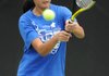 Rogers’ Tiffany Tang returns a shot Tuesday during the Class 7A state championships at the George M. Billingsley Tennis Center on the University of Arkansas campus. Go to <a href="http://www.nwaonline.com/photoreprints">nwaonline.com/photoreprints</a> to see more photos.