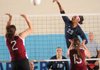 Summer Morgan, right, a Har-Ber senior, records a kill past Springdale High sophomores Laney Rhoads, left, and Lacey Davis on Tuesday, during play at Wildcat Arena at Har-Ber High in Springdale.