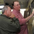 Fred Haenisch, left, looks over a map with Jack Stephens during a meeting Wednesday at Heritage High...
