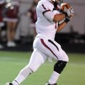 Tony Dennis, a Springdale High senior, scores a touchdown catch against Fayetteville in Harmon Field...