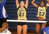 Kelsey Parks, left, Bentonville senior and Ariel Hornsby defend against the Rogers High Lady Mounties in King Arena. Bentonville wrapped up the No. 2 playoff seed from the 7A-West Conference and will get a bye in the first round of the Class 7A State Volleyball Tournament next week in Conway.
