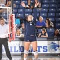 Kelsey Odell, a Springdale Har-Ber senior setter, sets the ball Tuesday during play against Springda...