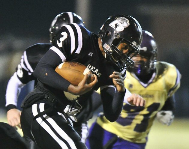 special-to-the-democrat-gazettejimmy-jones-beardens-qb-defonta-lowe-3-carries-the-ball-against-junction-city-during-their-playoff-game-friday-novemer-19th-the-game-was-played-at-bearden
