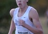 Austin Fox of Springdale Har-Ber keeps a steady pace to his run during the 7A-West Conference cross country meet Tuesday at Rogers High.
